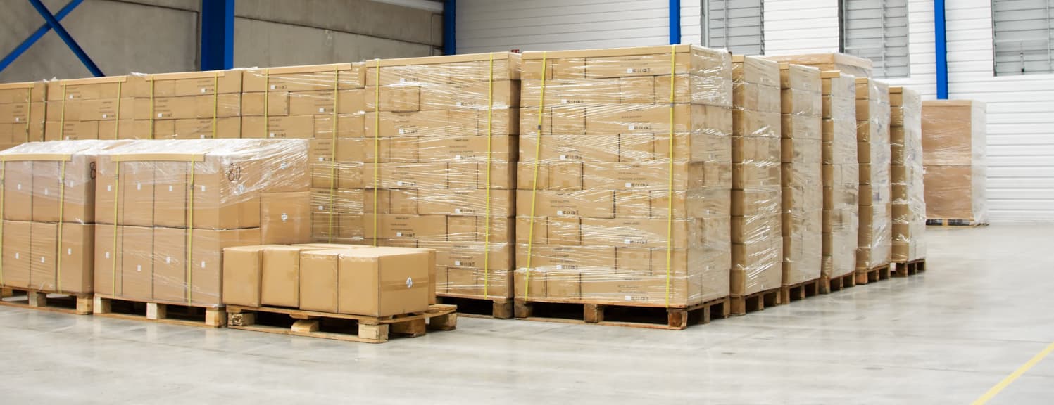 Shipping pallets wrapped and unwrapped