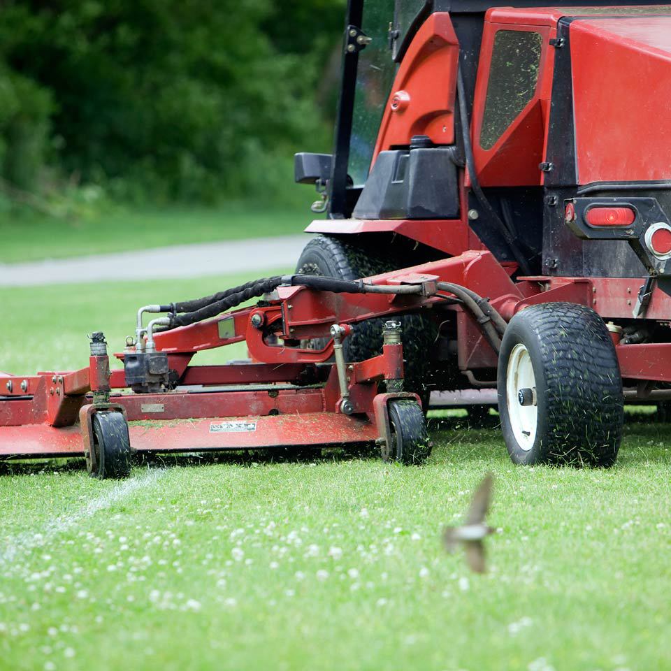 large red commercial turf mower